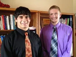 Chris O'Neill and Matt Howard, creators of One Goal, One Passion Scholarship, smile dressed up in ties.