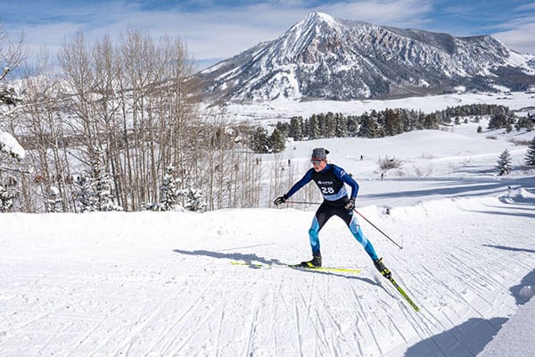 2025_CFGV_Report_Photos-1 Crested Butte Junior Nordic Skier Finn Veit racing with the mountain in the background