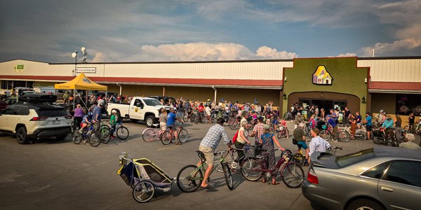 bikers gathering in a parking lot before the music cruise