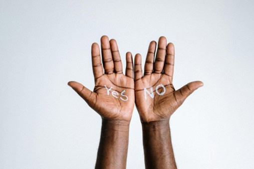 Yes No hands Photo of a pair of hands with yes and no written on the palms