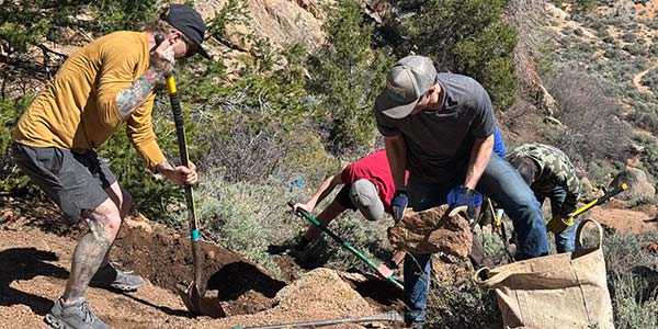 volunteers doing trailwork at Hartman Rocks
