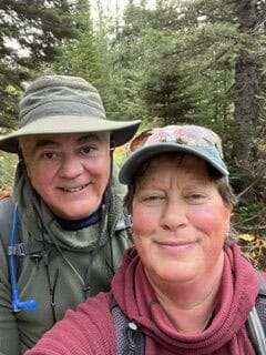 Selfie of a man and woman enjoying a summer hike in the Gunnison valley